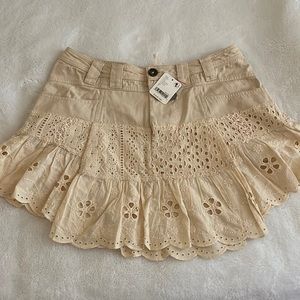 Free People Violet eyelet mini skirt in ivory color, size 2. New with tags.
